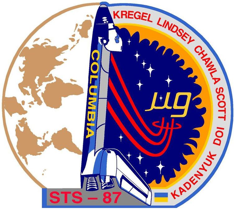 Символ космічної місії STS-87, на якому присутній прапор України.